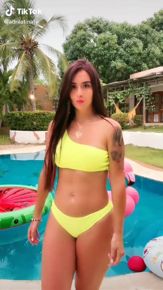 Adriana Valcárcel adrilatinatv swimming pool bikini yellow