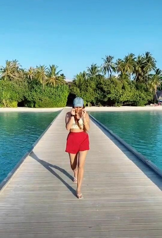 Ashi Khanna (@ashi_khanna12) #beach  #crop top  #white crop top  #shorts  #red shorts  #legs  «I miss traveling!    What are...»