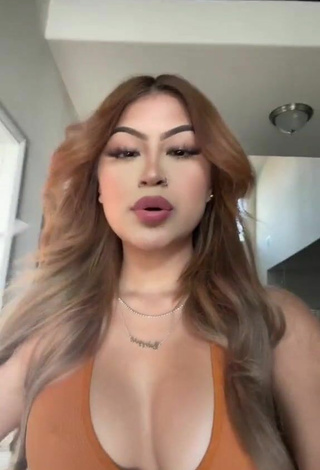 Desiree Montoya (@dxddy._.desi) #cleavage  #crop top  #orange crop top  «are we abt to um kiss  ‍♀️»