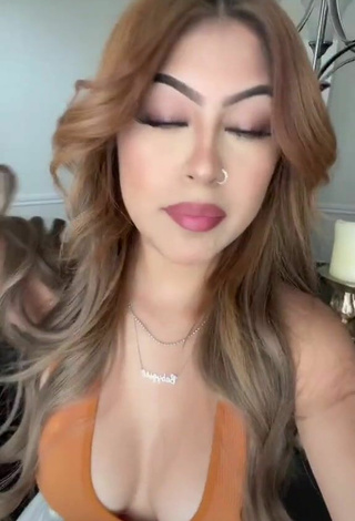 Desiree Montoya (@dxddy._.desi) #cleavage  #crop top  #orange crop top  «if y’all saw my last tiktok no...»