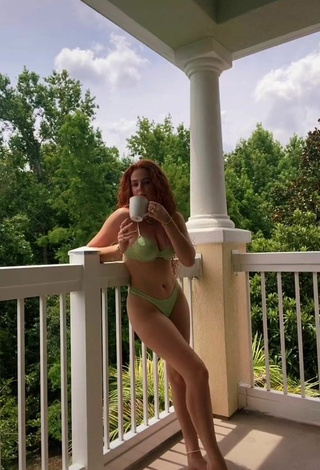 Faith Collins (@faithieeanne) #balcony  #bikini  #green bikini  «Romanticizing my morning coffee»