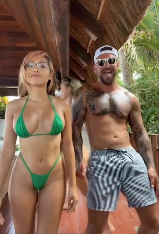 Maddy Belle (@itsmaddybelle) #belly button piercing  #mini bikini  #green mini bikini  #cleavage  «Learning how to dance merengue...»
