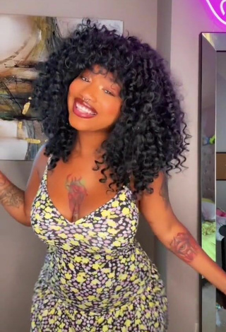 Mikeila Jones (@mikeilaj) #booty shaking  #sundress  #floral sundress  #cleavage  «lol idk»