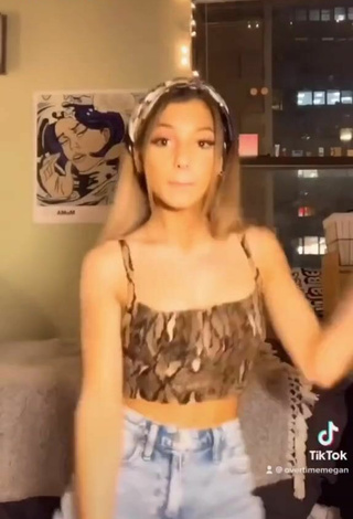 Megan Eugenio (@overtimemegan) #crop top  #booty shaking  #snake print crop top  #beige crop top  «#greenscreenvideo»