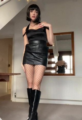 India Rawsthorn (@sunnymonday) #fishnet stockings  #black fishnet stockings  #top  #black top  #skirt  #leather skirt  «The wind was a paid actor...»