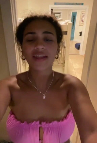 Corinne Carr (@corinnecarr) #cleavage  #bikini top  #side boob  #shorts  #pink bikini top 