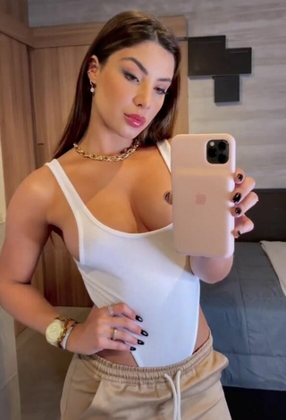 Gabriela Versiani (@gabiversiani) #cleavage  #bodysuit  #pants 