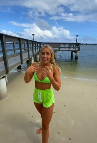Cassidy Thompson (@cassidy__t) #beach  #fitness  #bikini top  #lime green bikini top  #shorts  #lime green shorts  «I had to do 15 flips for each...»