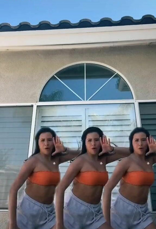 Devin Ramirez (@devin_ramirez) #tube top  #orange tube top  #shorts  #white shorts 