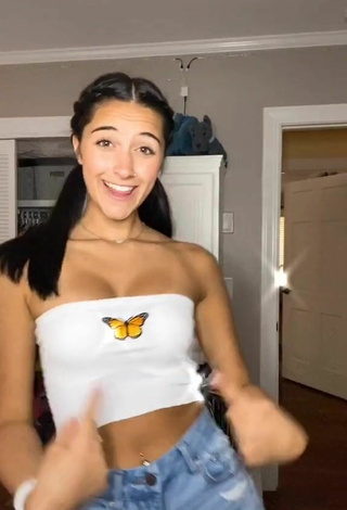 Taylor Mackenzie (@wow.its.taylorr) #tube top  #cleavage  #jeans shorts  #belly button piercing 