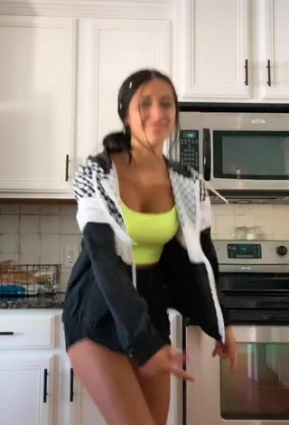 Taylor Mackenzie (@wow.its.taylorr) #crop top  #lime green crop top  #cleavage  #shorts  #black shorts  «First video of the day :)...»