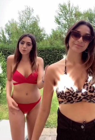 Cora & Marilu (@cora.e.marilu) #cleavage  #bikini  #red bikini  #belly button piercing 