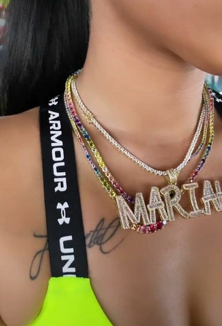 Mariah Angeliq (@mariahangeliqoficial) #cleavage  #crop top  #yellow crop top  #tattooed body 