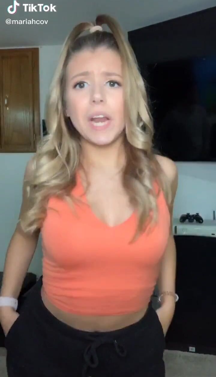 Mariah Covarrubias (@mariahcov) #cleavage #crop top #orange crop