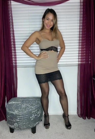 Atqofficial (@atqofficial_) #cleavage  #dress  #beige dress  #black stockings  #legs  «#fy #fyp #foryou #foryoupage...»