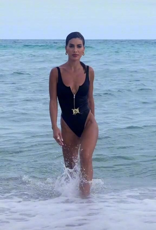 Camila Coelho (@camilacoelho) #cleavage  #swimsuit  #black swimsuit  #sea  «Always wanted to be a Bond Girl...»
