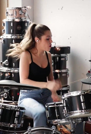 Domino Santantonio (@dominosantantonio) #cleavage  #top  #black top  #bouncing boobs  «Giiirls just want to play drums...»