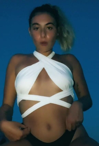 Grace of Toma (@graziaditoma_) #white bikini top  #bikini  #black bikini bottom  «Drippin in milano #duetto #viral...»
