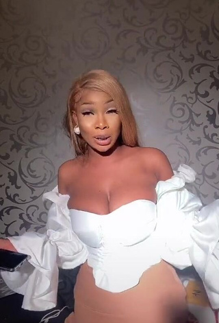 Tacha (@symply_tacha) #cleavage  #big boobs  #crop top  #white crop top  #skirt  #beige skirt  «Pandemic  scary right!! #fy #fyp...»