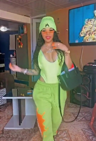 Anyuri Lozano (@anyurimusica2) #cleavage  #tattooed body  #swimsuit  #lime green swimsuit  #pants  #lime green pants  #booty shaking 