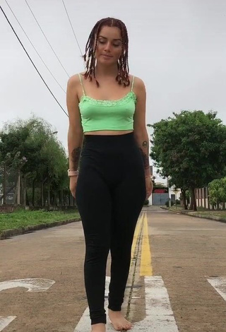 Julietaderomeo (@julietaderomeo) #crop top  #green crop top  #braless  #pokies  #street 