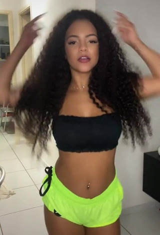 Ziane Martins (@zianemartins) #belly button piercing  #tube top  #bouncing boobs  #shorts  #lime green shorts  #black tube top 
