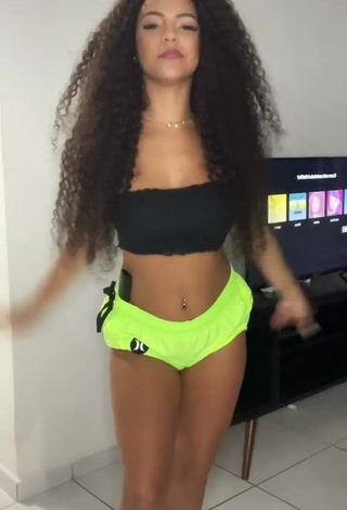 Ziane Martins (@zianemartins) #tube top  #black tube top  #booty shaking  #shorts  #lime green shorts  #cleavage 