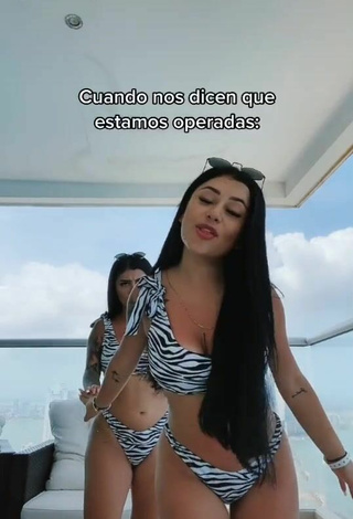 Gemelas Ortega (@gemelasortega) #balcony  #bikini  #zebra bikini  #tattooed body  «Metete en tus asuntos»