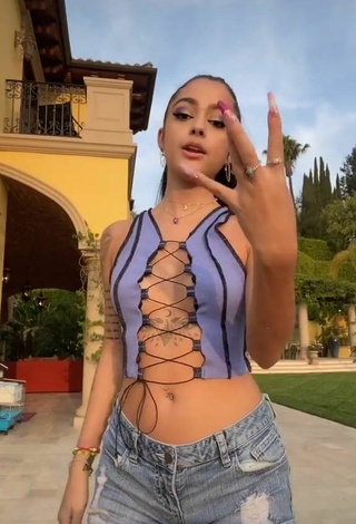 Malu Trevejo (@malutrevejo) #crop top  #purple crop top  #booty shaking  #shorts  #jeans shorts 