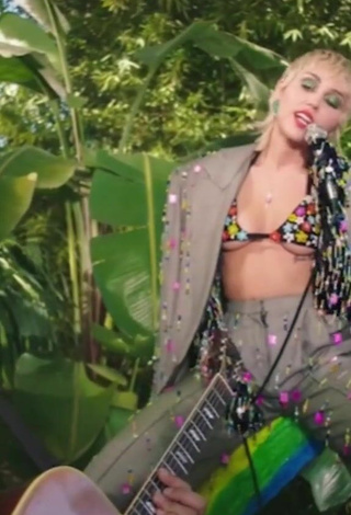 Miley Cyrus (@mileycyrus) #underboob  #bikini top  #pants  #cleavage  «Golden G String for Backyard...»