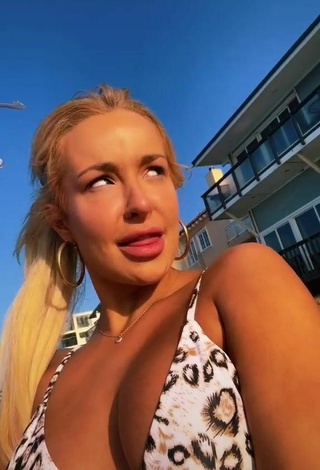 Tana Mongeau (@tanamongeaulol) #bikini top  #beach  «golden hour hitting different at...»