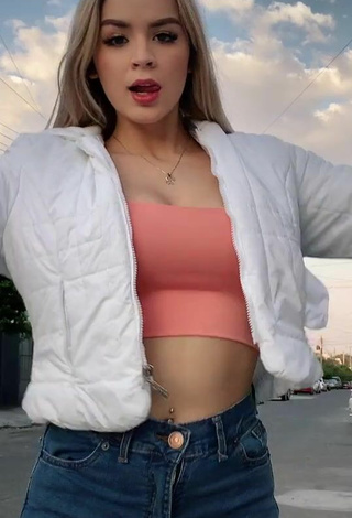 Carol Castro (@carol_icastro2) #crop top  #peach crop top  #belly button piercing  #cleavage 